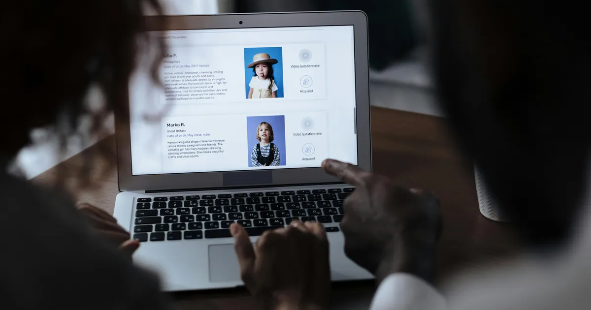 Person comparing internet provider details on a computer screen.
